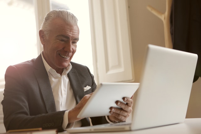 Elderly Man Using Computer