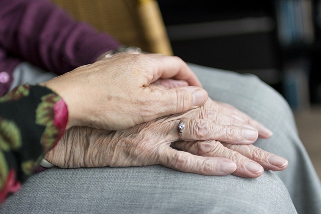 Elderly Woman Holding Hands